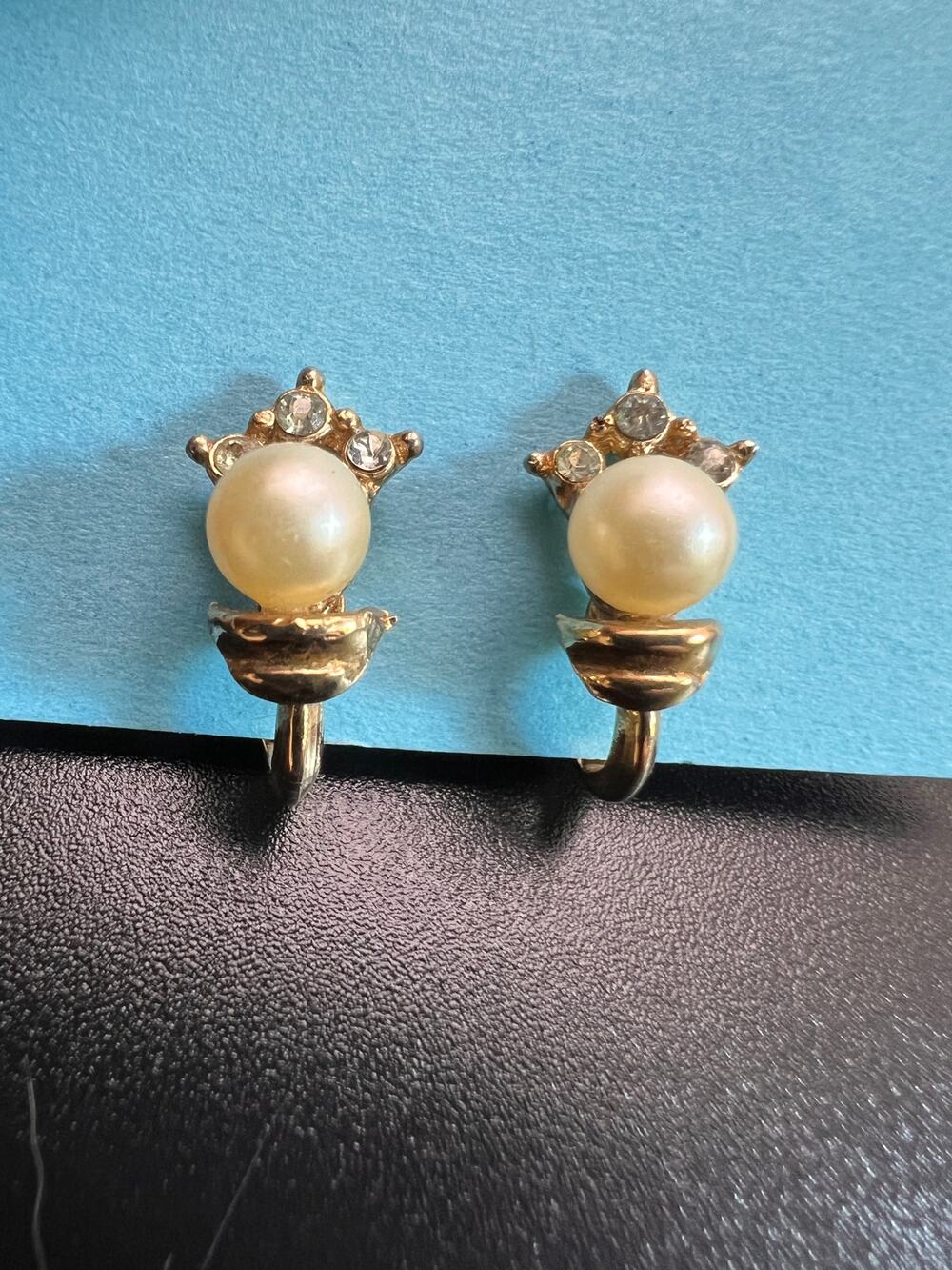 Vintage crown Trifari gold tone faux pearl clip on earrings designer fashion